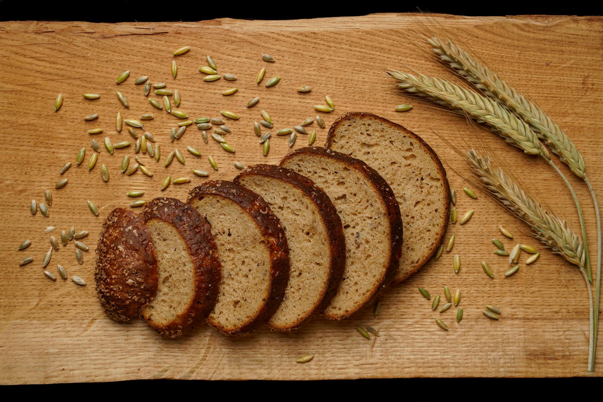 Slices of multigrain toast bread arranged on a serving surface